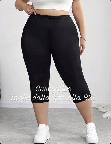 Set di abbigliamento sportivo nero per taglie forti da donna, leggings aderenti elasticizzati di lunghezza 7/8